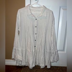 We the Free white, size medium, long-sleeved blouse.